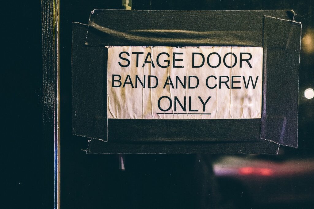 Behind the scenes stagehands work in theatre